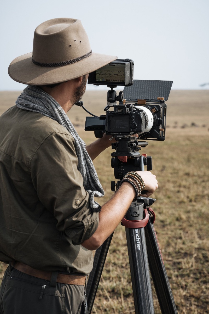 Chris-Schmid-sony-alpha-7RM4-chris-framing-a-shot-on-his-alpha-camera-mounted-on-a-tripod_1